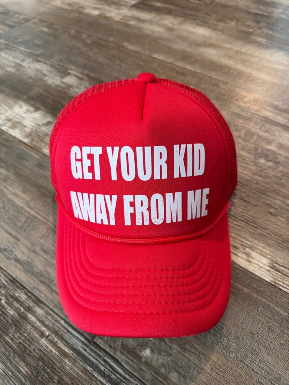 Red Trucker Hat with White Bold Text